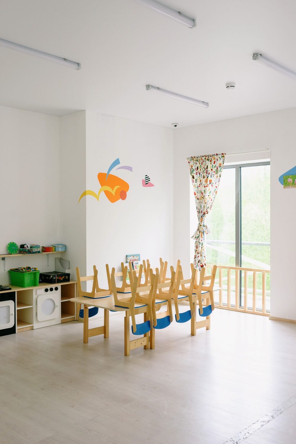 Learning tables and play kitchen area