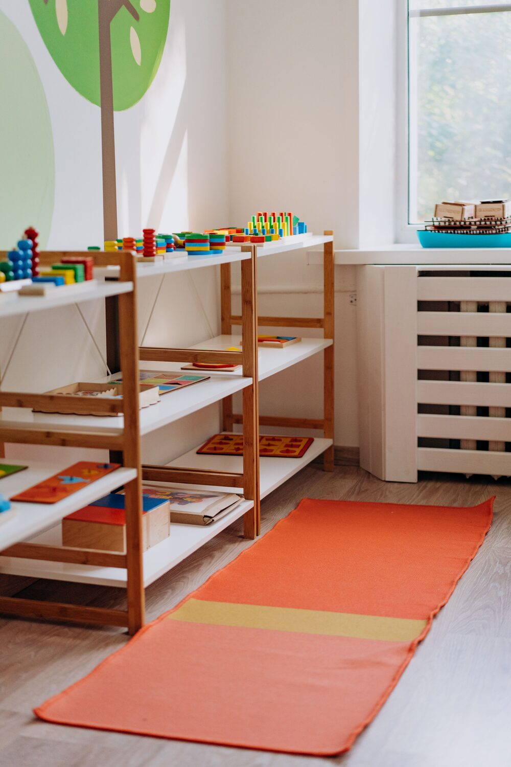 Cozy reading and play corner with wooden furniture